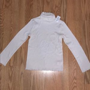 Girls off white turtleneck size 7/8